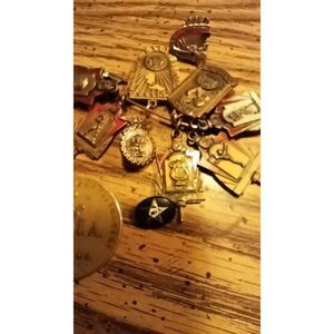 Antique pendents,pins awards. From high school sports i